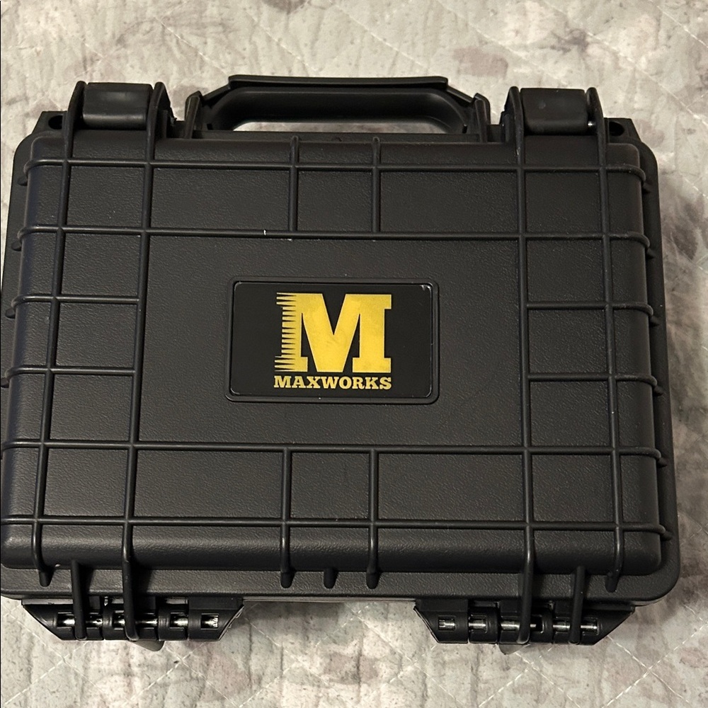 Maxworks Hard Protective Case in Black with Yellow Logo new never used.